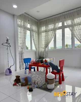 a room with chairs and a table with toys on the floor at Taiping City Centre Landed Corner Lot for 12 Pax in Taiping
