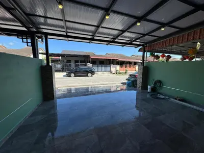 an open patio with a car parked in a parking lot at New PRMO !!! Ipoh Staycation Homefeel 50