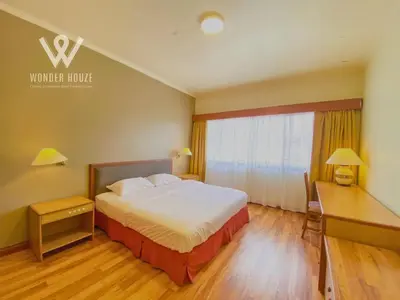 a hotel room with a bed and a desk at Cozy Highlands Escape at Copthorne Cameron Highlands in Tanah Rata