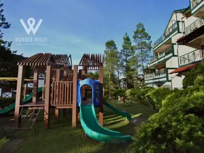 a playground with a slide in front of a building at Cozy Highlands Escape at Copthorne Cameron Highlands in Tanah Rata