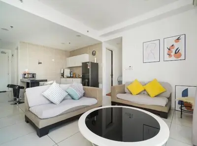 a living room with two couches and a table at 2Br Sunway Onsen Suit 5 Pax in Tambun