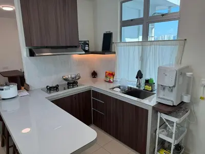 a kitchen with a sink and a microwave at Domuss Guesthouse- 4B3B Tunas in Bayan Lepas