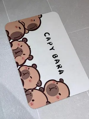 a group ofeddy bears on a paper with the words happymite at Capy House Taiping in Taiping