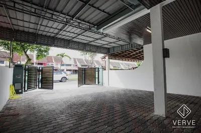 an empty parking lot with open garage doors at Ipoh Yistay by Verve 10 Pax 4B4B in Ipoh