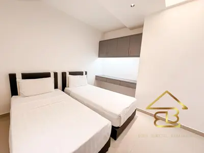 two beds in a small room with white walls at 7BR Huge House, 6 Bathroom, 20Pax, 10 min to IpohCity in Ipoh
