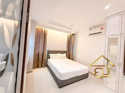 a white bedroom with a bed and a window at 7BR Huge House, 6 Bathroom, 20Pax, 10 min to IpohCity in Ipoh