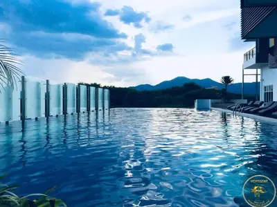 a pool of water in front of a building at Heart of Town Free WIFI -Majestic Ipoh By Hopestay in Ipoh