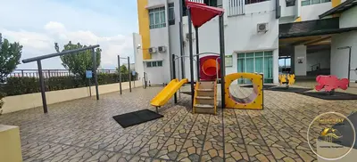 a playground in front of a building with a slide at Heart of Town Free WIFI -Majestic Ipoh By Hopestay in Ipoh