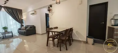 a living room with a table and chairs and a couch at Heart of Town Free WIFI -Majestic Ipoh By Hopestay in Ipoh