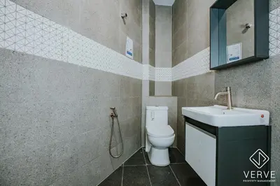 a bathroom with a toilet and a sink at Ipoh 55 Private Pool By Verve 26PAX in Ipoh