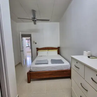 a bedroom with a bed and a ceiling at Setia Arena Penang, Queensbay, Airport, Bridge, Wetmarket, Nasi Kandar in Bayan Lepas