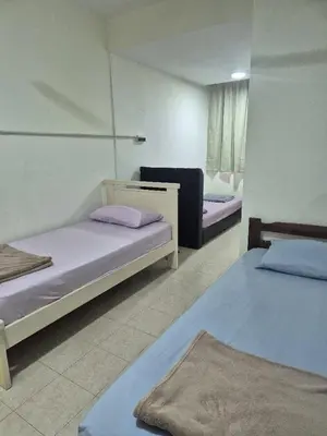a room with two beds in a room at Setia Arena Penang, Queensbay, Airport, Bridge, Wetmarket, Nasi Kandar in Bayan Lepas