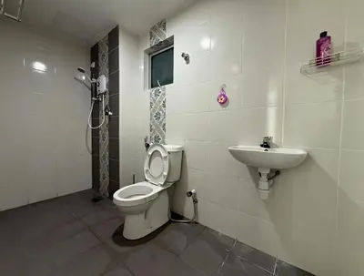 a bathroom with a toilet and a sink at Ipoh Town 3pax Suite The Anderson Residence #516 in Ipoh