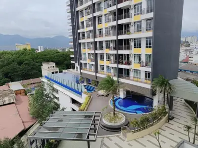 an aerial view of a building with a swimming pool at Heart of Ipoh 2BR 6pp in Ipoh