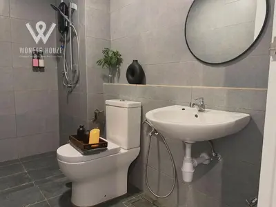 a bathroom with a sink and a toilet and a mirror at Modern 3BR Retreat at Bandar Baru Air Itam near Air Itam and Kek Lok Si in Ayer Itam