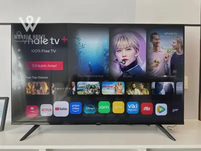 a flat screen tv on a stand with many different apps at Modern 3BR Retreat at Bandar Baru Air Itam near Air Itam and Kek Lok Si in Ayer Itam