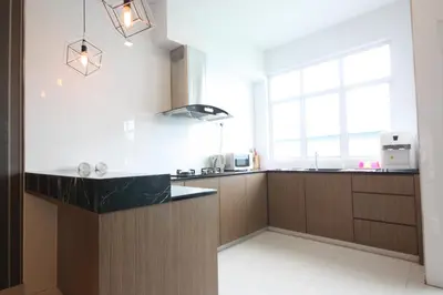 a kitchen with a counter top and a sink at Shamrock Beach Villas 9 Seaview in George Town