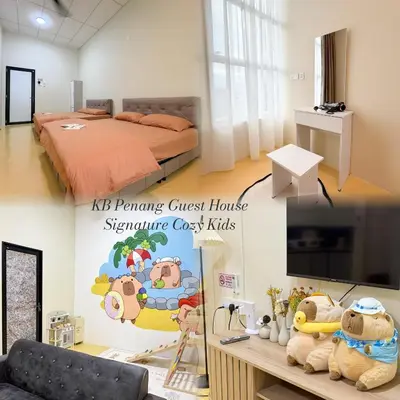 a bedroom with a bed and a tv in it at KB Penang Guest House Bertam Avenue 1-10pax Signature Cozy Kids in Kepala Batas