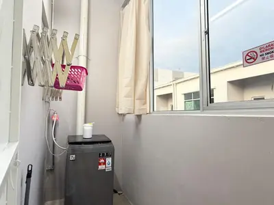 a small refrigerator in a room with a window at KB Penang Guest House Bertam Avenue 1-10pax Signature Cozy Kids in Kepala Batas