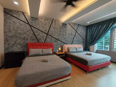 a bedroom with two beds in a room at Lahat Mines Signature Stay in Lahat