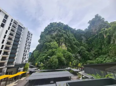 a view of a mountain from a hotel at Ipoh The Cove Hillside Premier Suites By LUX SUITE in Ipoh
