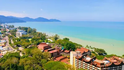 an aerial view of a city and the water at Sri Sayang Homestay 2 in Batu Ferringhi
