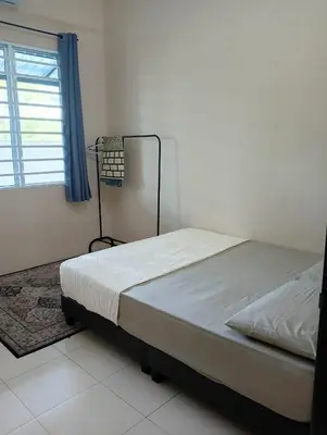 a bed in a room with a window at TheBunga Homestay w Private Pool&Karaoke -Tronoh Perak in Teronoh