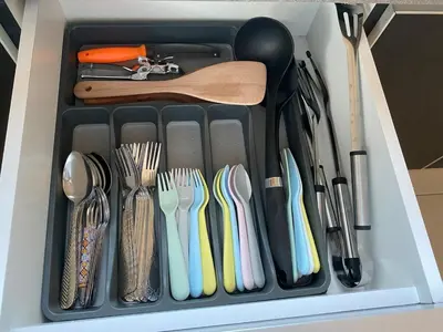 a drawer filled with utensils and forks and spoons at TheBunga Homestay w Private Pool&Karaoke -Tronoh Perak in Teronoh
