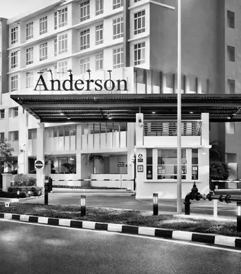 a large building with a sign on the front of it at Anderson Apartment by LUMO LIMA in Ipoh