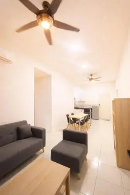 a living room with a couch and a table at Anderson Apartment by LUMO LIMA in Ipoh