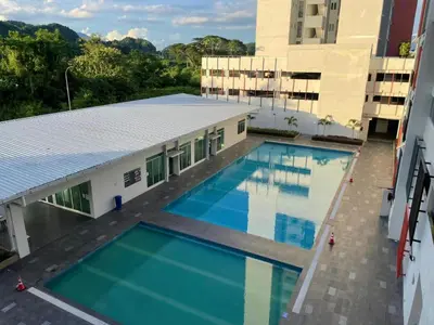 an overhead view of a building with a swimming pool at Anderson Apartment by LUMO LIMA in Ipoh