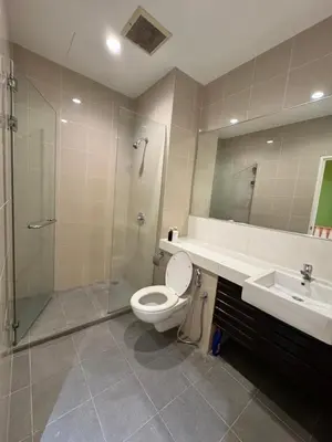 a bathroom with a toilet and a shower and a sink at Penang Stay 2-6px Convenient Free parking in George Town