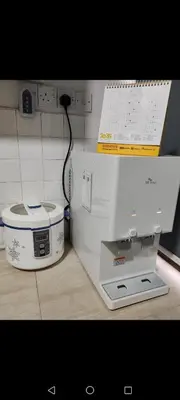 a white machine sitting on top of a counter at Tambun - Near LWOT, PLUS Highway Access ,Sunway & Pantai Hosp in Tambun