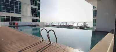 a swimming pool on the roof of a building at 2BR Maritime Suite Duplex George Town SeaView in George Town