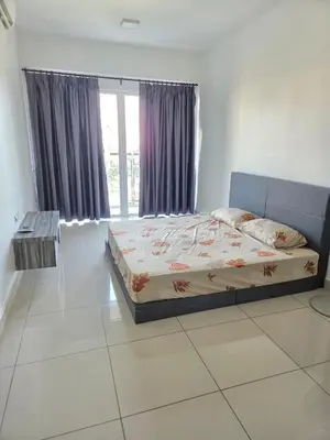 a bedroom with a bed and a large window at 3BR Condo near Queensbay, Penang in Bayan Lepas