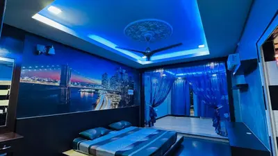 a room with a bed and a blue ceiling at Homestay, Lunas Kulim near BKE highway with 3 spacious rooms and fully furnished in Lunas
