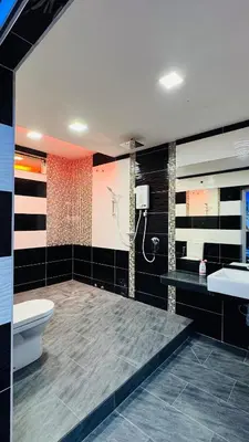 a bathroom with a toilet and a sink at Homestay, Lunas Kulim near BKE highway with 3 spacious rooms and fully furnished in Lunas