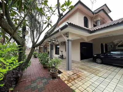 a car parked in front of a house at Garden vibe STAYcation Hillside in Ipoh