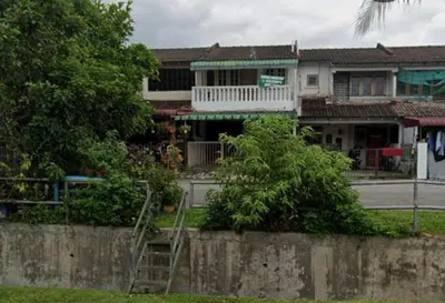 a house with a staircase in front of it at Aishah homestay in Ipoh