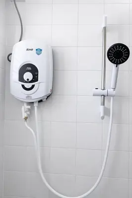 a shower head with a whiteumption at 525A Homestay Malim Nawar in Malim Nawar