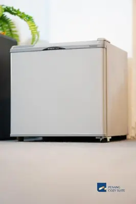 a white refrigerator sitting on top of a counter at Cozy Nanny House 2-6Pax #Georgetown #Hameediyah in George Town