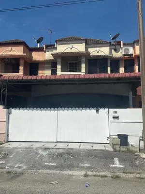 a white fence in front of a building at MRB Homestay in Ipoh
