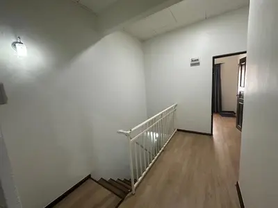 an empty hallway with a staircase in a building at MRB Homestay in Ipoh