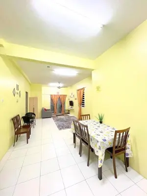 a dining room with a table and chairs at THE QUINTET BY D Atas Bukit Antarium in Tanah Rata