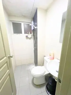 a bathroom with a toilet and a sink at THE QUINTET BY D Atas Bukit Antarium in Tanah Rata