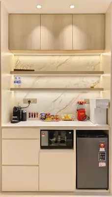 a kitchen with a counter top with a microwave at 22 Macalisterz - King Suite - 65