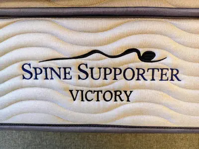 a sign for a spring superiorvictory on a wall at 22 Macalisterz - King Suite - 65