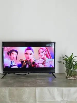 a flat screen tv sitting on top of a table at Homestay Taman Segar 23 for musleem in TanjongMalim