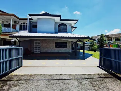 a house with a gate in front of it at Spacious 4BR Corner with Pool Table in Ipoh