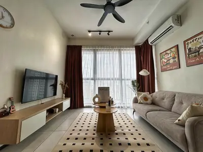 a living room with a couch and a ceiling fan at Le Cozy Cabin - 2B2R SeaCity View Infinity Pool in George Town